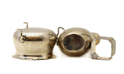Lot 72 - A silver cream jug, bowl and napkin ring