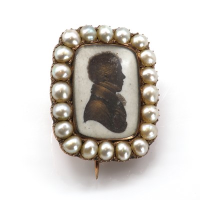 Lot 5 - A Georgian bronzed silhouette and pearl lace pin