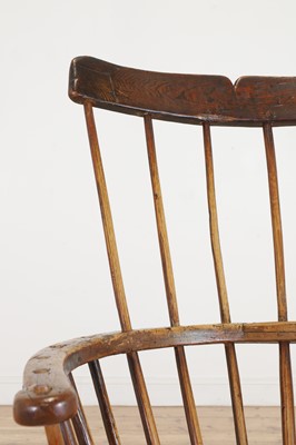 Lot 356 - A large ash and elm comb-back Windsor armchair