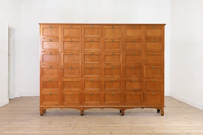 Lot 413 - A large solid satinwood cabinet from the Edward Grey Institute of Field Ornithology