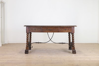 Lot 476 - A beech and wrought-iron centre table