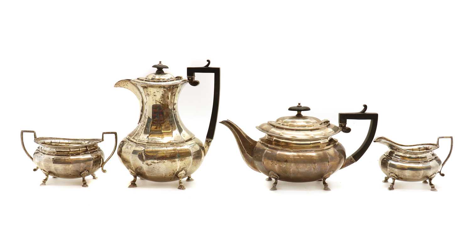 Lot 80 A four piece silver tea service,