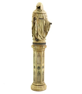 Lot 525 - A Gothic-style marble garden sculpture