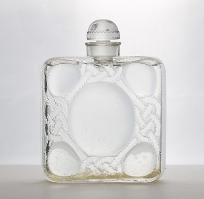 Lot - A collection of twenty-four Lalique miniature perfume bottles