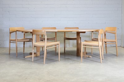 Lot 375 - A Danish oak dining suite