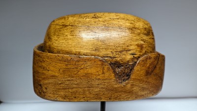 Lot 503 - Two fruitwood milliner's stands or hat moulds
