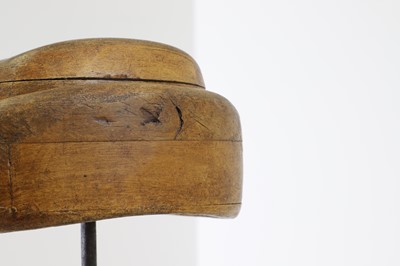 Lot 503 - Two fruitwood milliner's stands or hat moulds