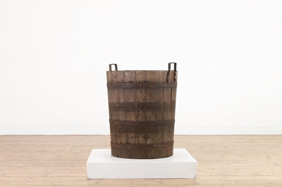 Lot 474 - A large wooden coopered bucket or planter