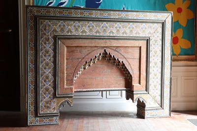 Lot 243 - A massive carved and painted overdoor or arch