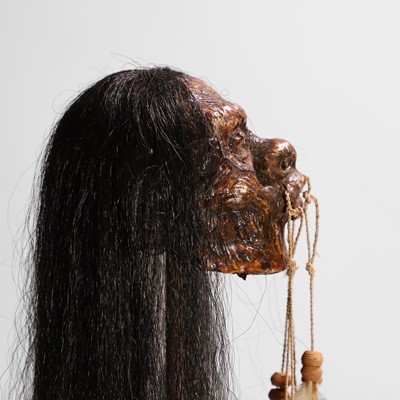 Lot 60 - A replica shrunken head