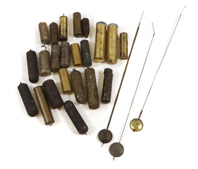 Lot 361A - A collection of longcase clock weights and pendulums