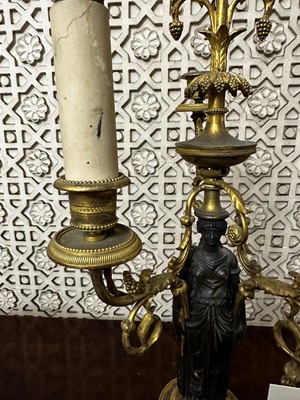 Lot 395 - ☘ A pair of Regency gilt and patinated bronze candelabra