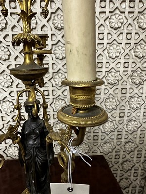 Lot 395 - ☘ A pair of Regency gilt and patinated bronze candelabra