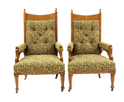 Lot 262 - A pair of Arts & Crafts oak armchairs