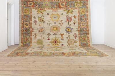 Lot 286 - An Oushak wool carpet
