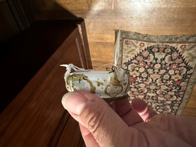 Lot 371 - ☘ An enamel tea caddy