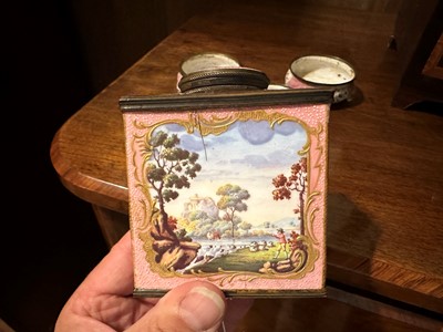 Lot 371 - ☘ An enamel tea caddy