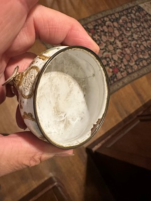 Lot 371 - ☘ An enamel tea caddy