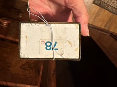 Lot 371 - ☘ An enamel tea caddy