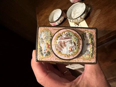 Lot 371 - ☘ An enamel tea caddy