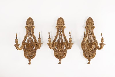 Lot 305 - A set of three Louis XIV-style giltwood wall lights