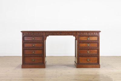 Lot 204 - A Victorian oak twin-pedestal desk in the George II taste