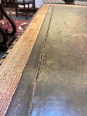 Lot 204 - A Victorian oak twin-pedestal desk in the George II taste
