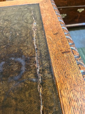 Lot 204 - A Victorian oak twin-pedestal desk in the George II taste