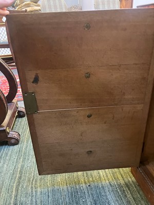 Lot 204 - A Victorian oak twin-pedestal desk in the George II taste