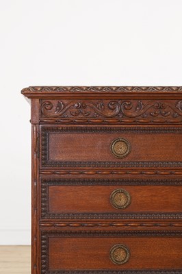 Lot 204 - A Victorian oak twin-pedestal desk in the George II taste