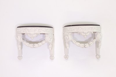 Lot 139 - A pair of carved and painted wooden brackets in the manner of Robert Adam