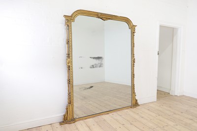 Lot 211 - A large giltwood overmantel mirror