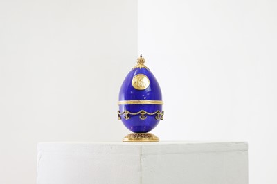 Lot 323A - A silver-gilt and enamel egg