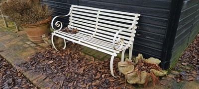Lot 508 - A wrought iron garden bench