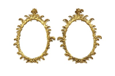 Lot 485 - A pair of giltwood oval mirrors in the style of William and John Linnell
