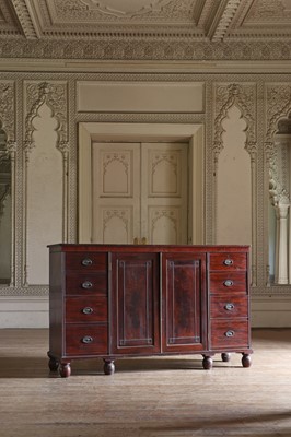 Lot 285 - ☘ A large mahogany low press cupboard in the manner of William Trotter