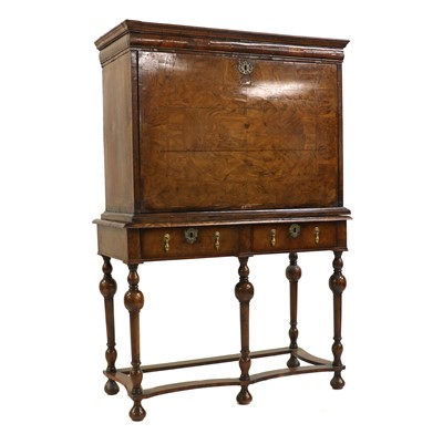 Lot 400 - A William and Mary walnut cabinet on stand
