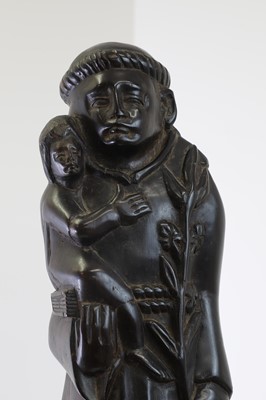 Lot 266 - A carved ebony figure of St Anthony