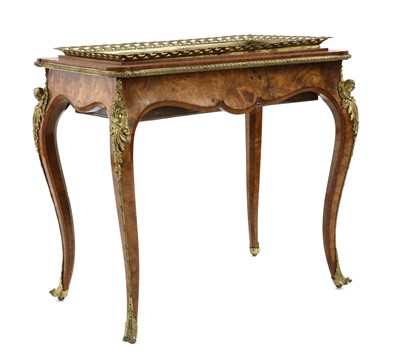 Lot 464 - A Louis XV-style walnut and gilt-metal jardiniere table