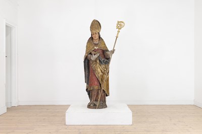 Lot 313 - A carved and polychrome-painted pine figure of a saint