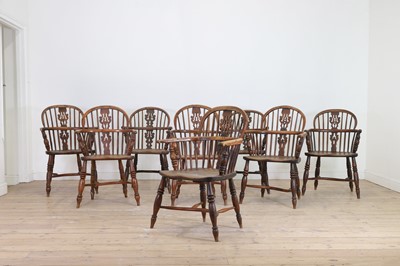 Lot 533 - A set of eight yew and elm Windsor chairs