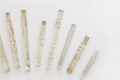 Lot 304 - A collection of glass perfume bottles