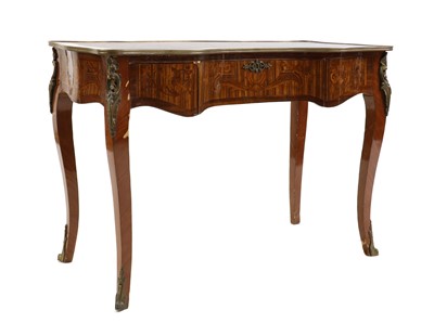 Lot 494 - A Louis XV-style walnut and marquetry bureau plat