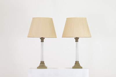 Lot 121 - A pair of gilt-metal and moulded glass column lamps