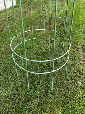 Lot 432 - A set of six modern obelisk ironwork garden plant stands