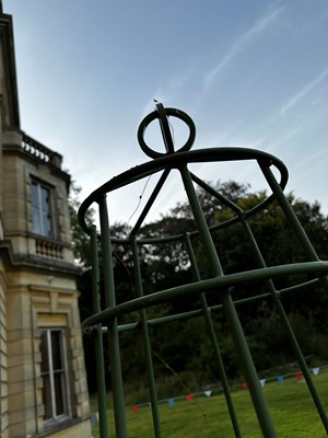 Lot 432 - A set of six modern obelisk ironwork garden plant stands