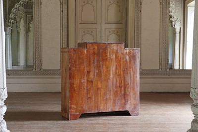 Lot 204 - An Art Deco walnut crossbanded breakfront cocktail cabinet