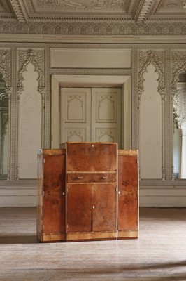Lot 204 - An Art Deco walnut crossbanded breakfront cocktail cabinet