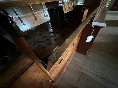 Lot 204 - An Art Deco walnut crossbanded breakfront cocktail cabinet