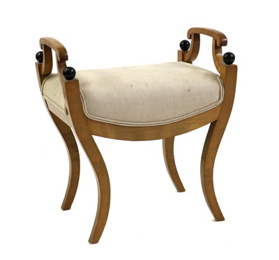 Lot 429 - A Biedermeier-style maple and ebonised stool